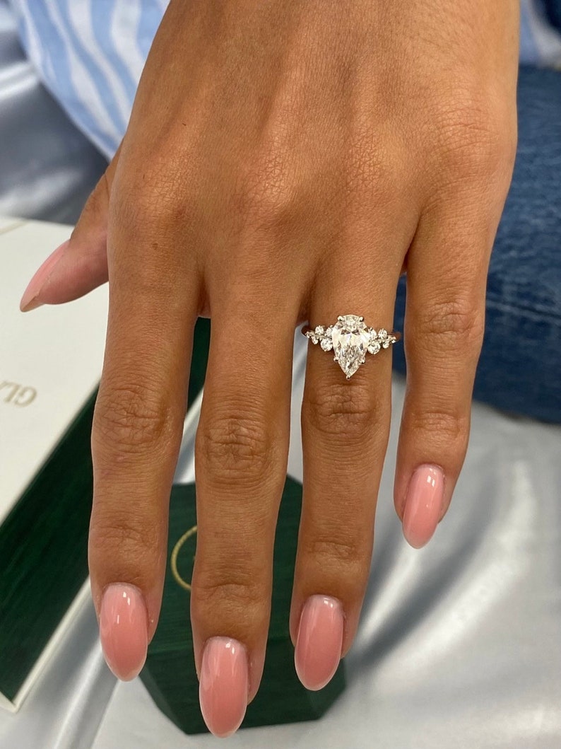 Stunning 1.50 CT Pear Moissanite Engagement Ring with Cluster Design 5