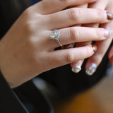 Stunning 1.0 - 2.0 CT Pear Moissanite Engagement Ring with Cluster Design 4
