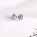 0.70 TCW Round Cut Moissanite Halo Stud Earrings in Gold 1