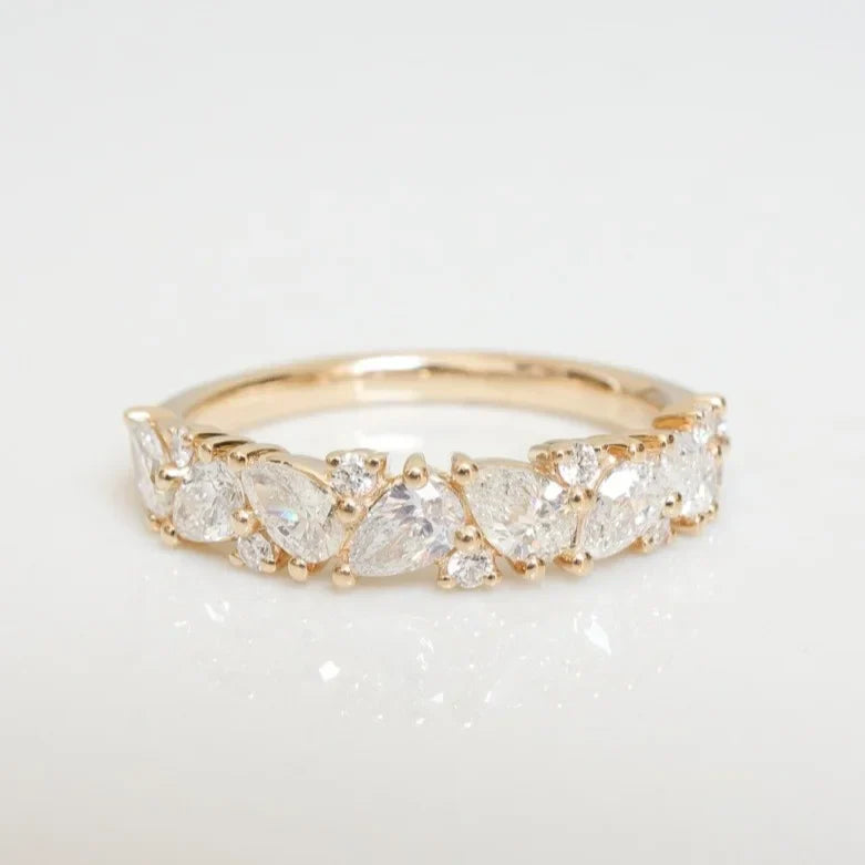 Stunning 0.4 TCW Pear & Round Moissanite Stones Alternate Wedding Band 1