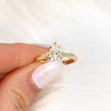 Stunning 1.50 CT Pear Moissanite Engagement Ring with Twisted Pave Design 9
