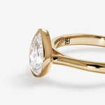 Stunning 1.25 CT Pear Moissanite Engagement Ring with Bezel Design 5
