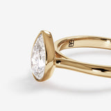 Stunning 1.25 CT Pear Moissanite Engagement Ring with Bezel Design 5