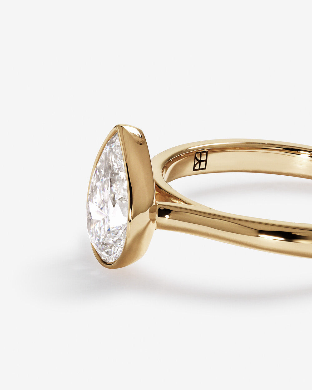 Stunning 1.25 CT Pear Moissanite Engagement Ring with Bezel Design 5