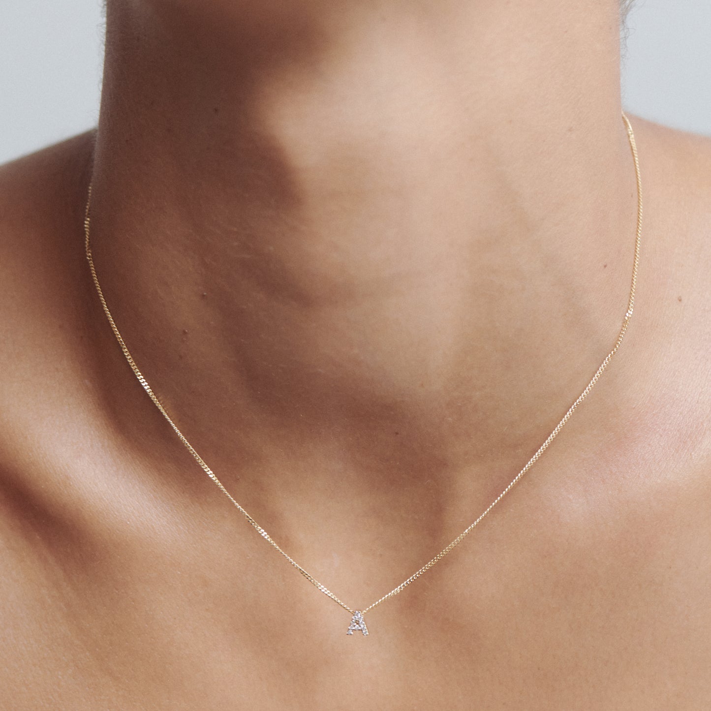 0.085 TCW Round Moissanite Diamond Letter Pendant Necklace in Solid Gold 2