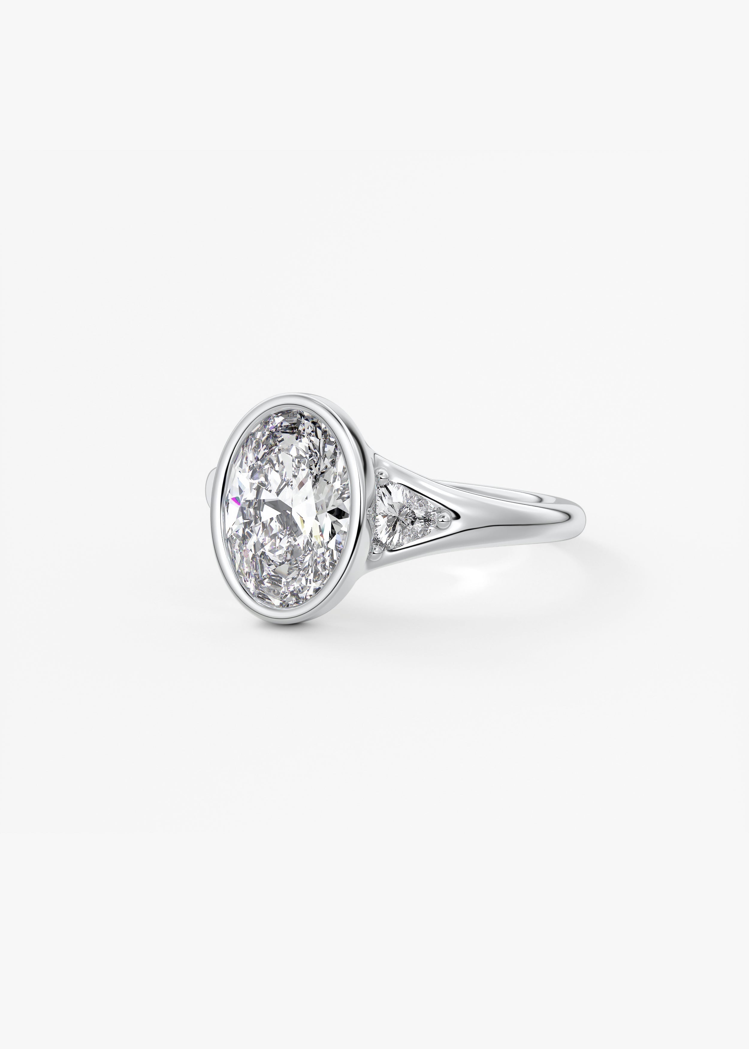 Oval Three Stone Bezel Lab Grown Diamond Engagement Ring