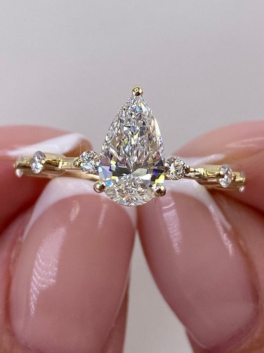 Stunning 1.0 CT Pear Moissanite Engagement Ring with Dainty Pave Design 1