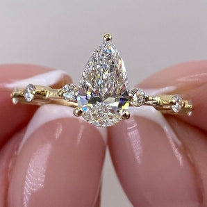 Stunning 1.0 CT Pear Moissanite Engagement Ring with Dainty Pave Design