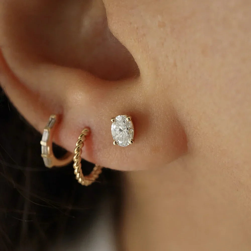 Classic 0.50 TCW Oval Cut Moissanite Stud Earrings in Gold 4