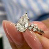 Stunning 1.50 CT Pear Moissanite Engagement Ring with Cluster Design 6
