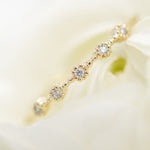 Stunning 0.2 TCW Round Moissanite Stones 5 Stones Wedding Bands 8