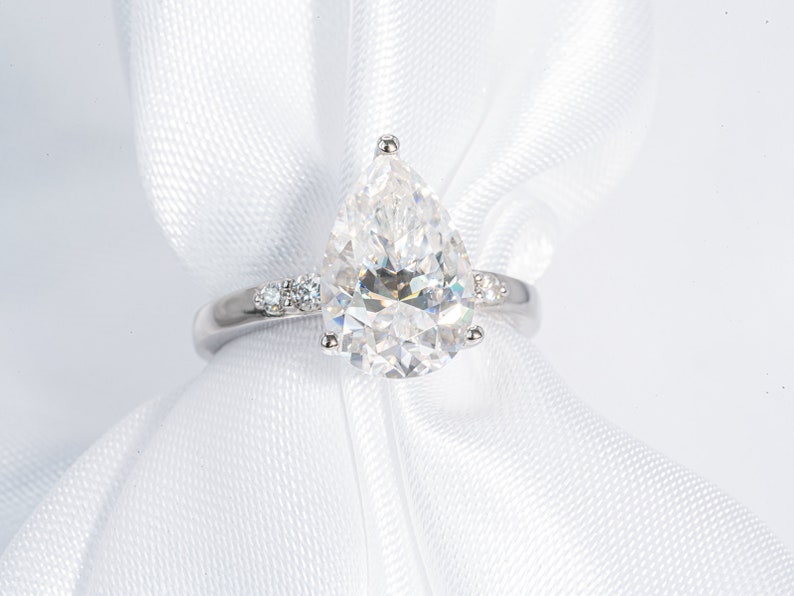 Stunning 3.0 CT Pear Cut Moissanite Engagement Ring with Pave Design 8