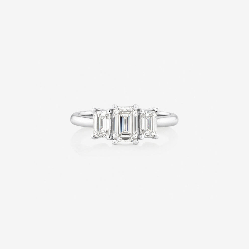 Stunning 1.30 CT Emerald Moissanite Engagement Ring with Three Stones Design 1