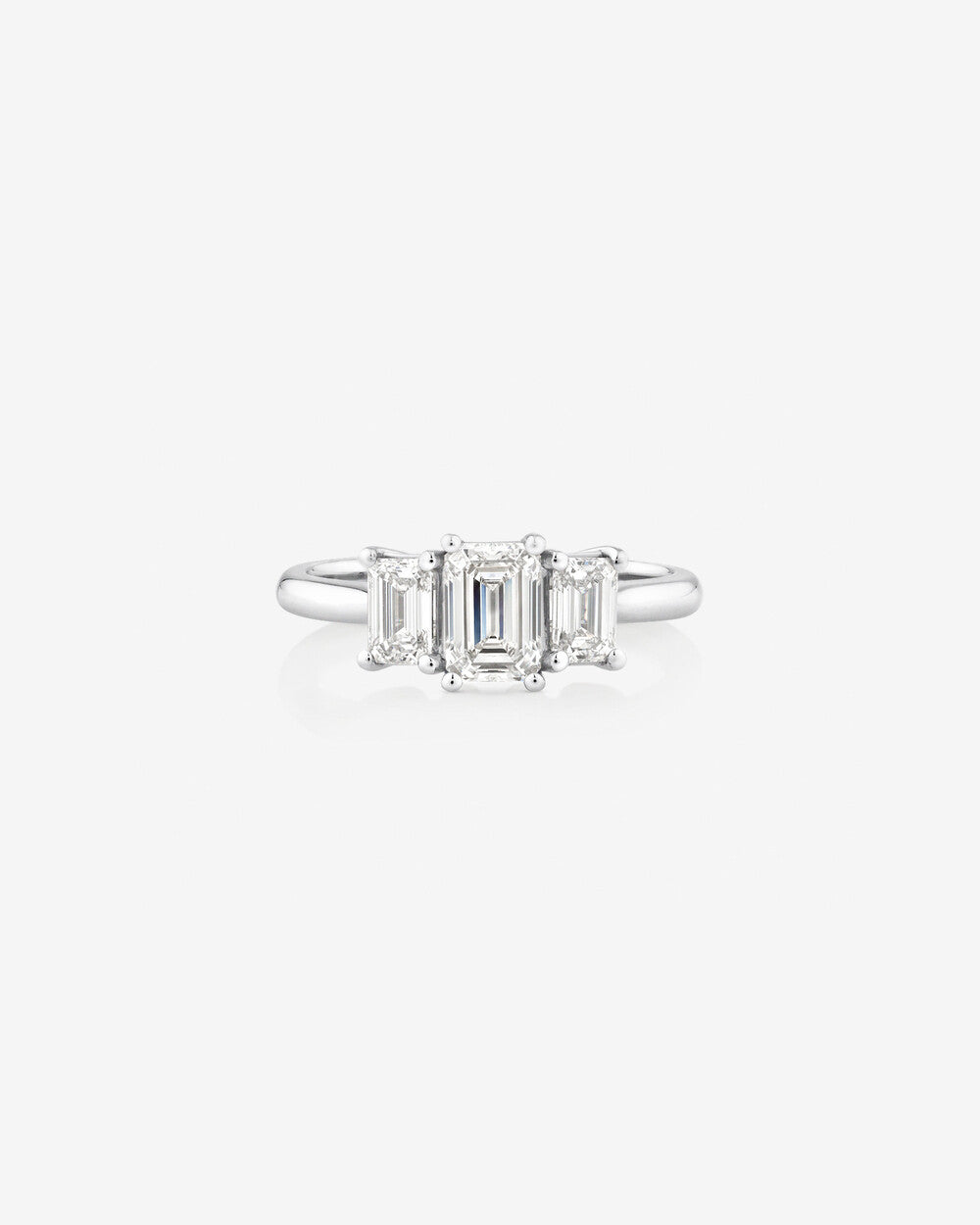 Stunning 1.30 CT Emerald Moissanite Engagement Ring with Three Stones Design 1