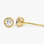0.50 TCW Round Cut Moissanite Stud Earrings in Gold 1