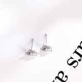 0.70 TCW Round Cut Moissanite Stud Earrings in Gold 9
