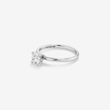 Stunning 0.7 CT Round Moissanite Solitaire Design Engagement Ring 4