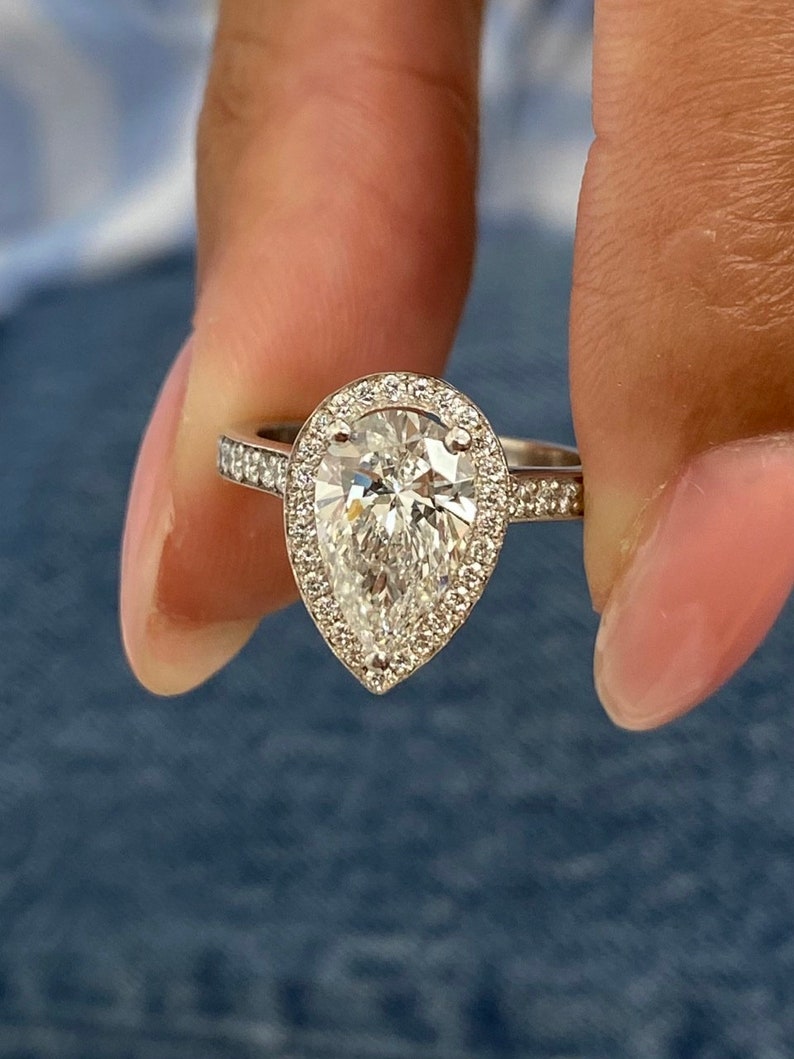 Stunning 1.75 CT Pear Moissanite Engagement Ring with Halo & Pave Design 1