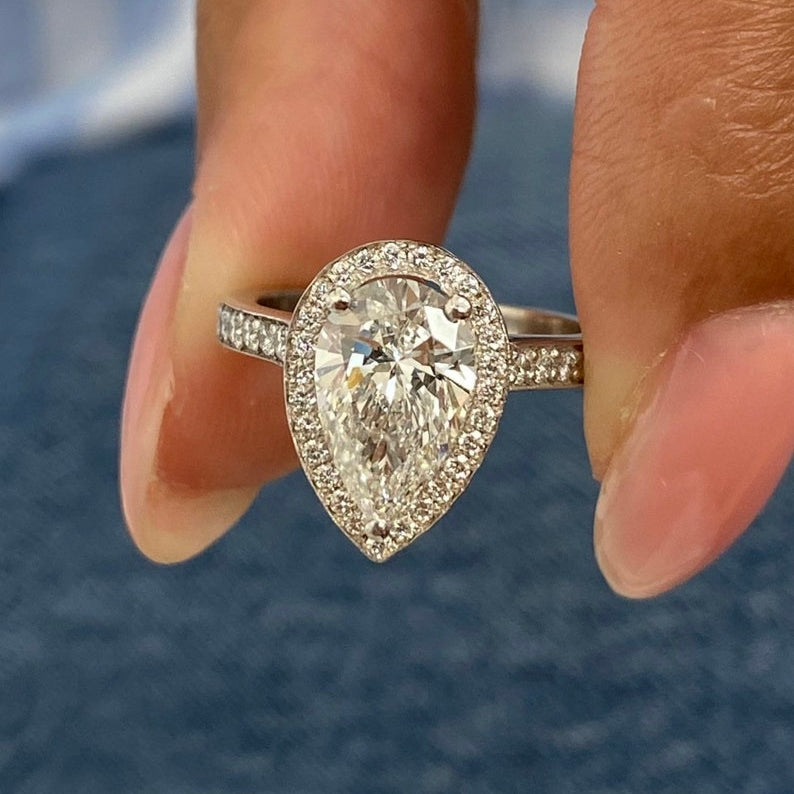 Stunning 1.75 CT Pear Moissanite Engagement Ring with Halo & Pave Design 1