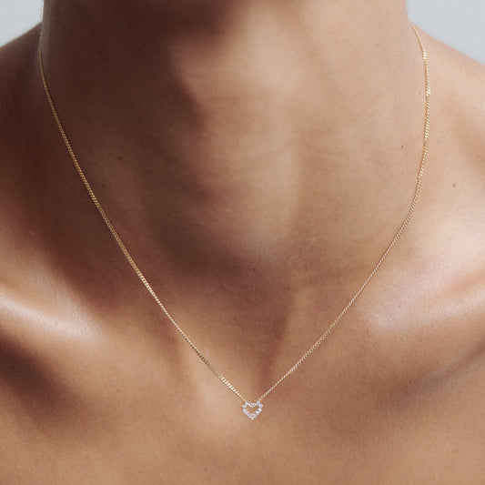 0.065 TCW Round Moissanite Diamond Heart Pendant Necklace in Solid Gold 1
