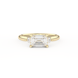 Emerald Cut 1.31 Carat Moissanite Ring – Three Stones Setting in Gold