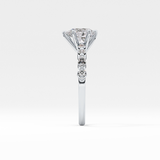 Pear Cut 0.93 Carat Moissanite Ring – Pave Setting in Gold