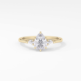 Pear Cut 0.86 Carat Moissanite Ring – Three Stones Setting in Gold