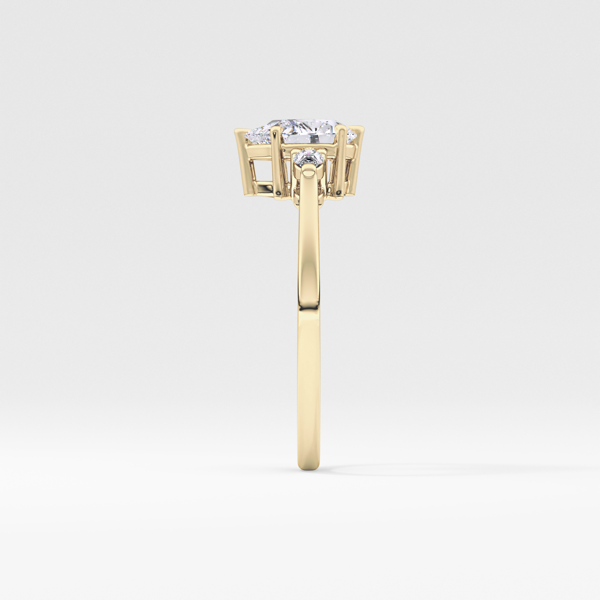 Pear Cut 0.86 Carat Moissanite Ring – Three Stones Setting in Gold