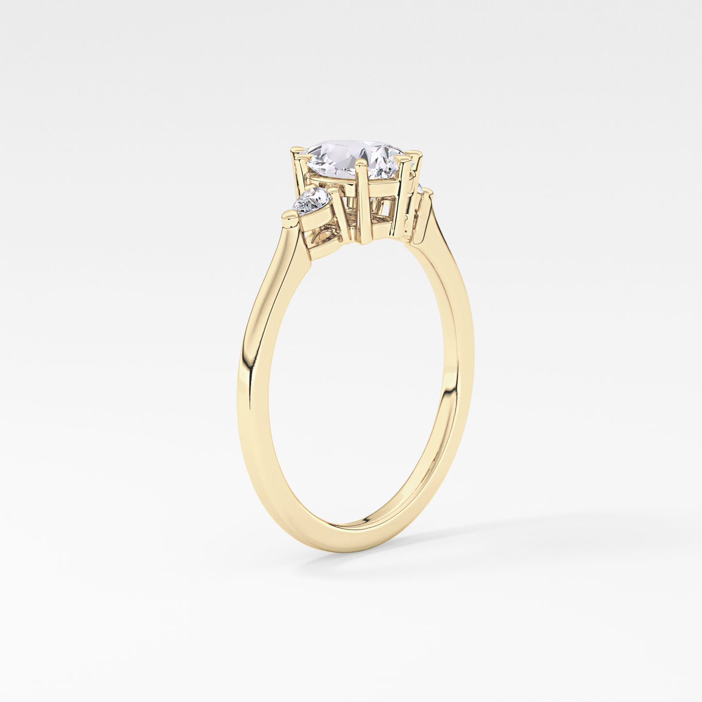 Pear Cut 0.86 Carat Moissanite Ring – Three Stones Setting in Gold