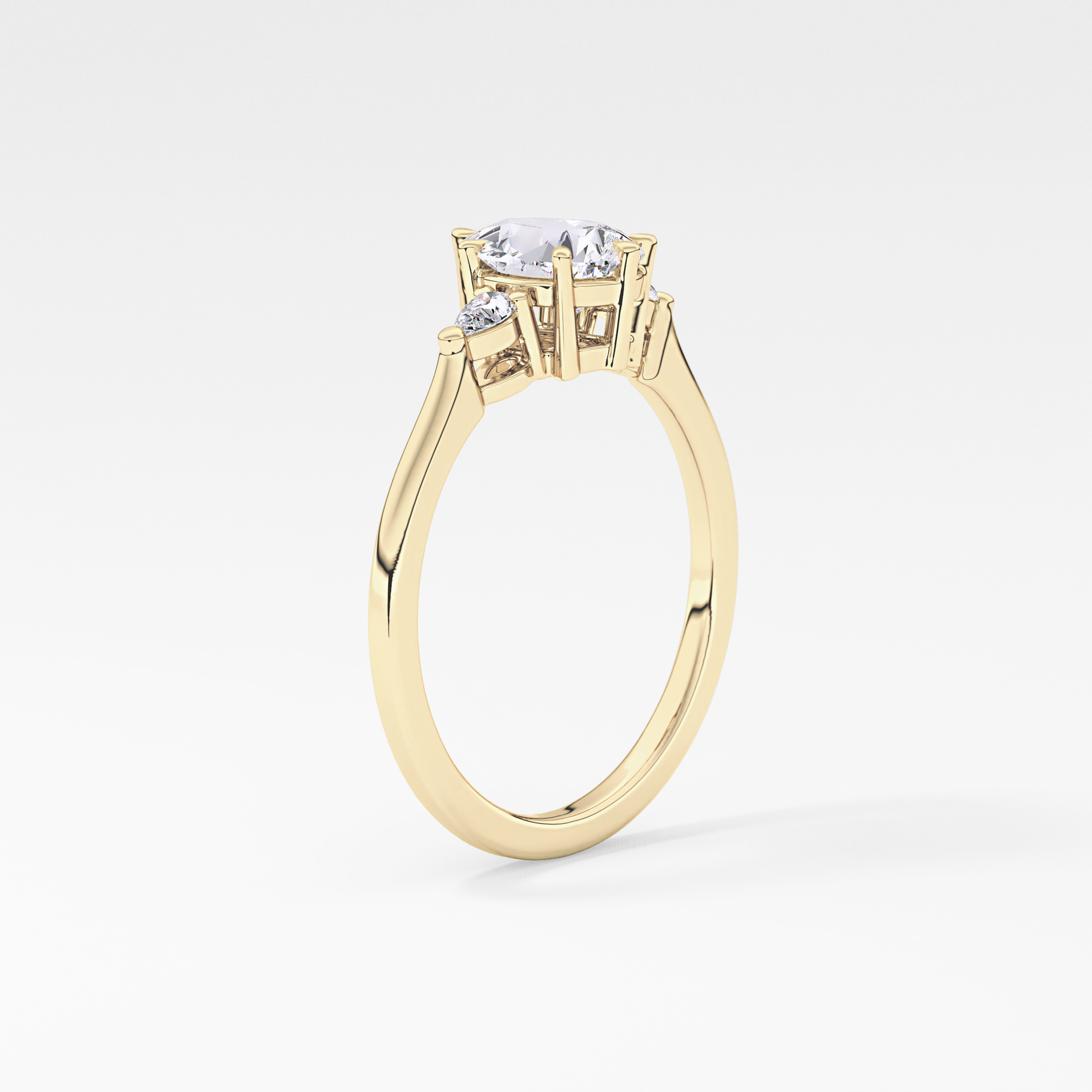 Pear Cut 0.86 Carat Moissanite Ring – Three Stones Setting in Gold
