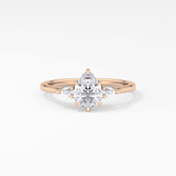 Pear Cut 0.86 Carat Moissanite Ring – Three Stones Setting in Gold