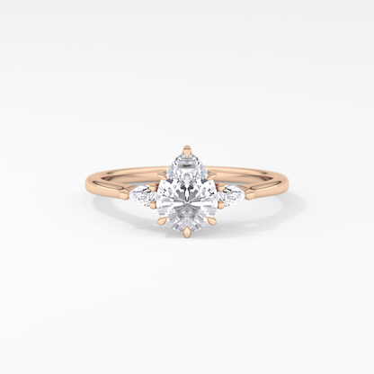 Pear Cut 0.86 Carat Moissanite Ring – Three Stones Setting in Gold