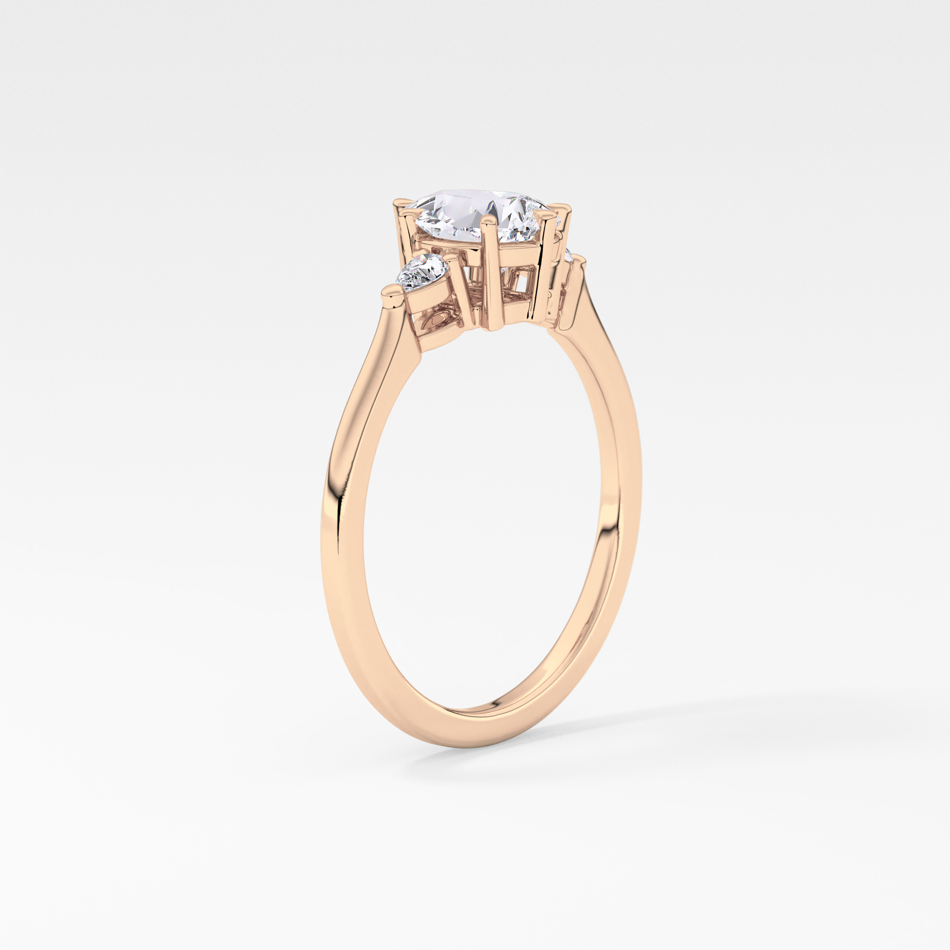 Pear Cut 0.86 Carat Moissanite Ring – Three Stones Setting in Gold