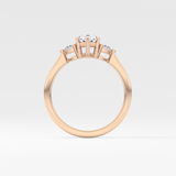 Pear Cut 0.86 Carat Moissanite Ring – Three Stones Setting in Gold