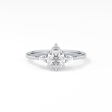 Pear Cut 0.86 Carat Moissanite Ring – Three Stones Setting in Gold