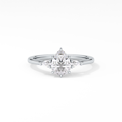Pear Cut 0.86 Carat Moissanite Ring – Three Stones Setting in Gold