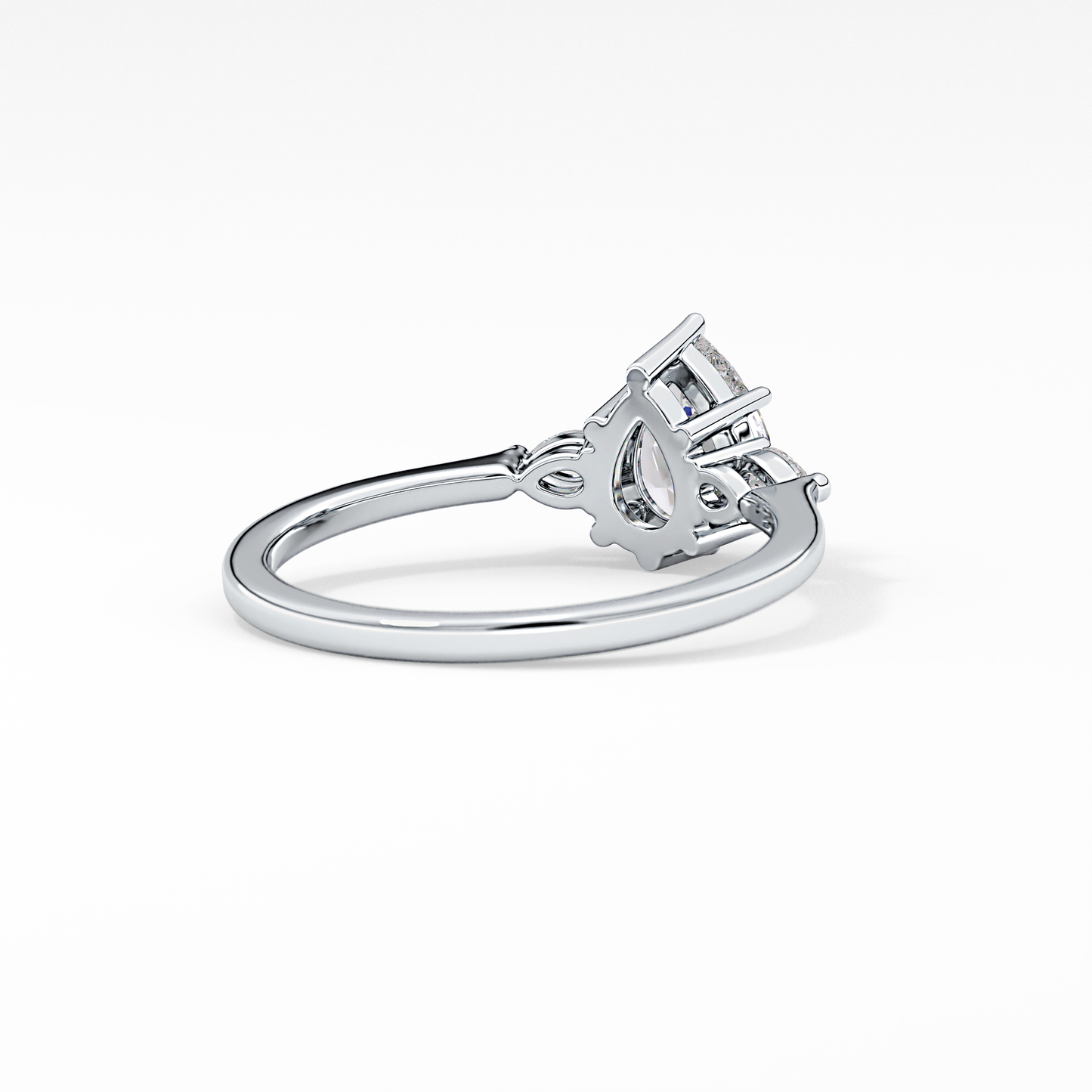 Pear Cut 0.86 Carat Moissanite Ring – Three Stones Setting in Gold