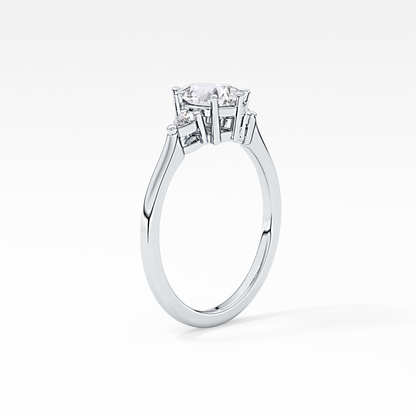 Pear Cut 0.86 Carat Moissanite Ring – Three Stones Setting in Gold