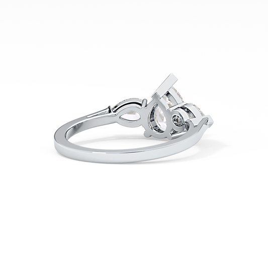 Pear Cut 0.81 Carat Moissanite Ring – Three Stones Setting in Gold