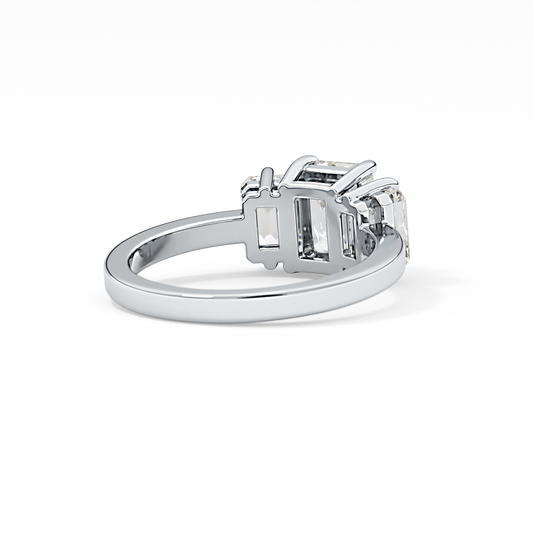Emerald Cut 1.25 Carat Moissanite Ring – Three Stones Setting in Gold
