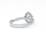 Pear Cut 0.81 Carat Moissanite Ring – Twisted Shank, Halo and Pave Setting in Gold