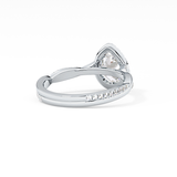 Pear Cut 0.81 Carat Moissanite Ring – Twisted Shank, Halo and Pave Setting in Gold