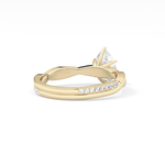 Pear Cut 0.81 Carat Moissanite Ring – Criss Cross Pave Setting in Gold