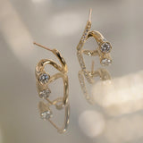 0.36 TCW Round Lab Grown Diamond Curved Earring