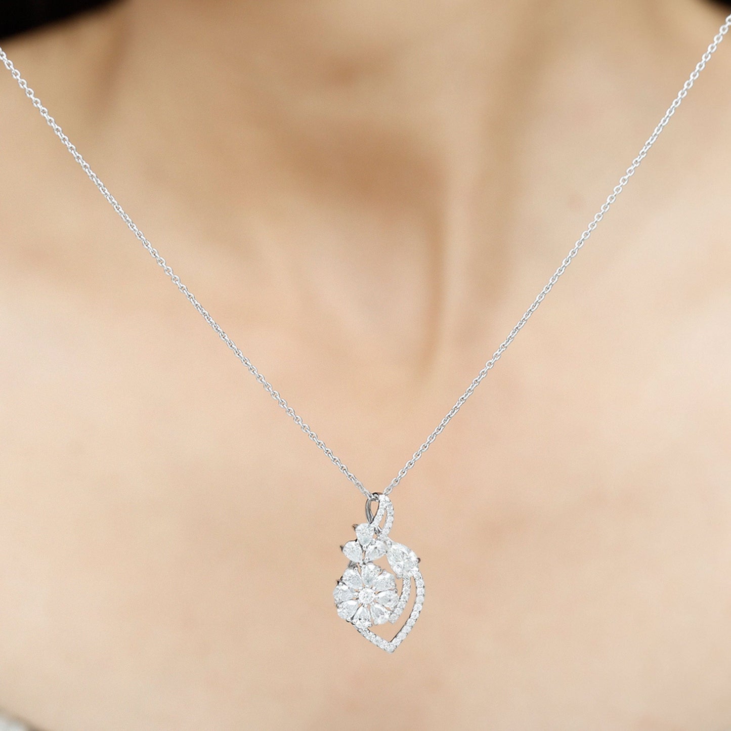 
                  
                    1.39 TCW Pear & Round Cut Moissanite Infinity Necklace
                  
                