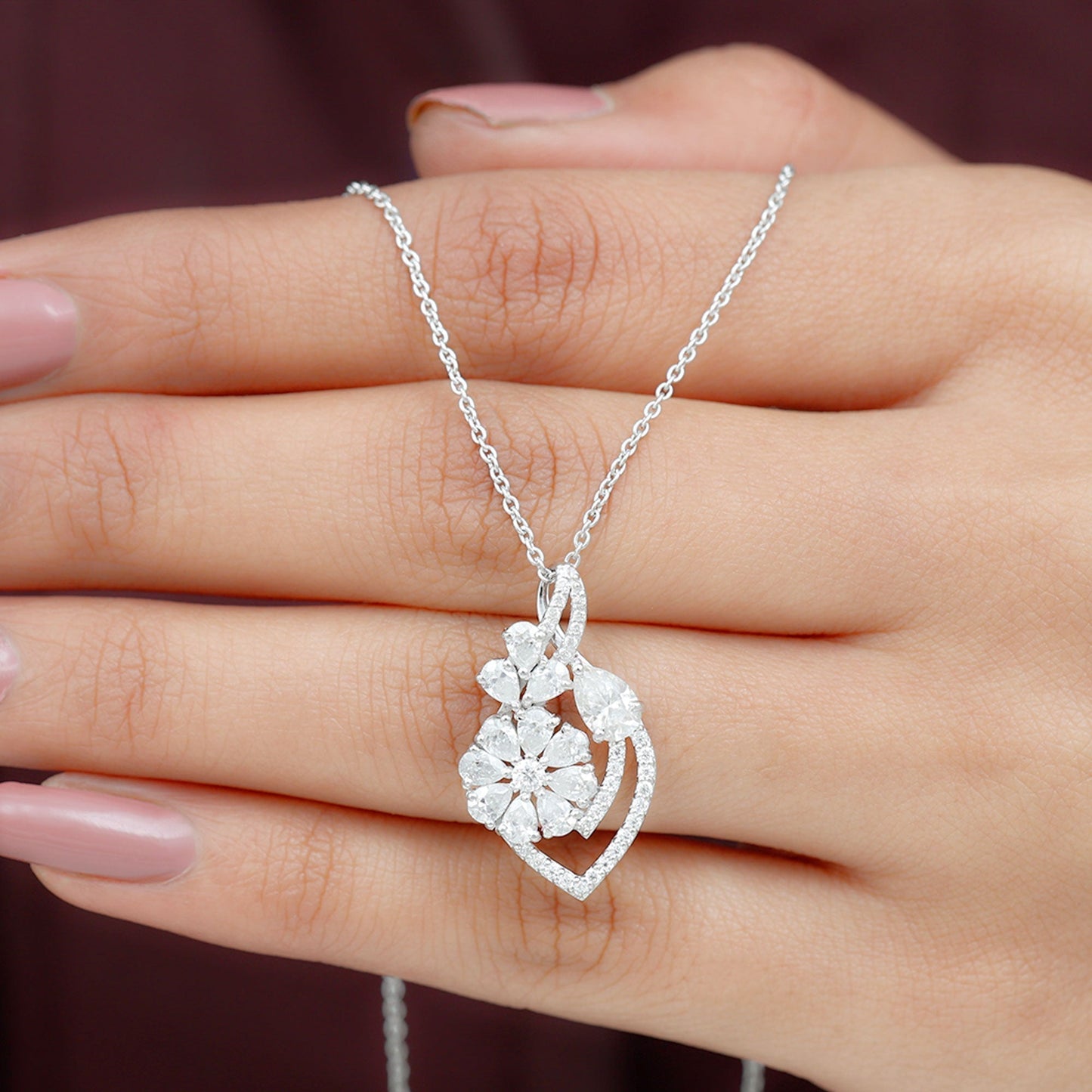 
                  
                    1.39 TCW Pear & Round Cut Moissanite Infinity Necklace
                  
                