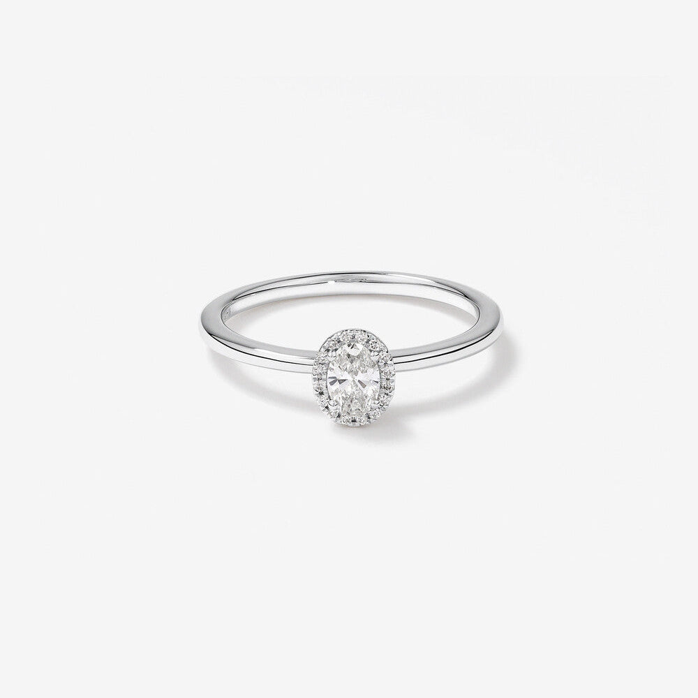 Stunning 0.3 CT Oval Moissanite Engagement Ring In Halo Design 1