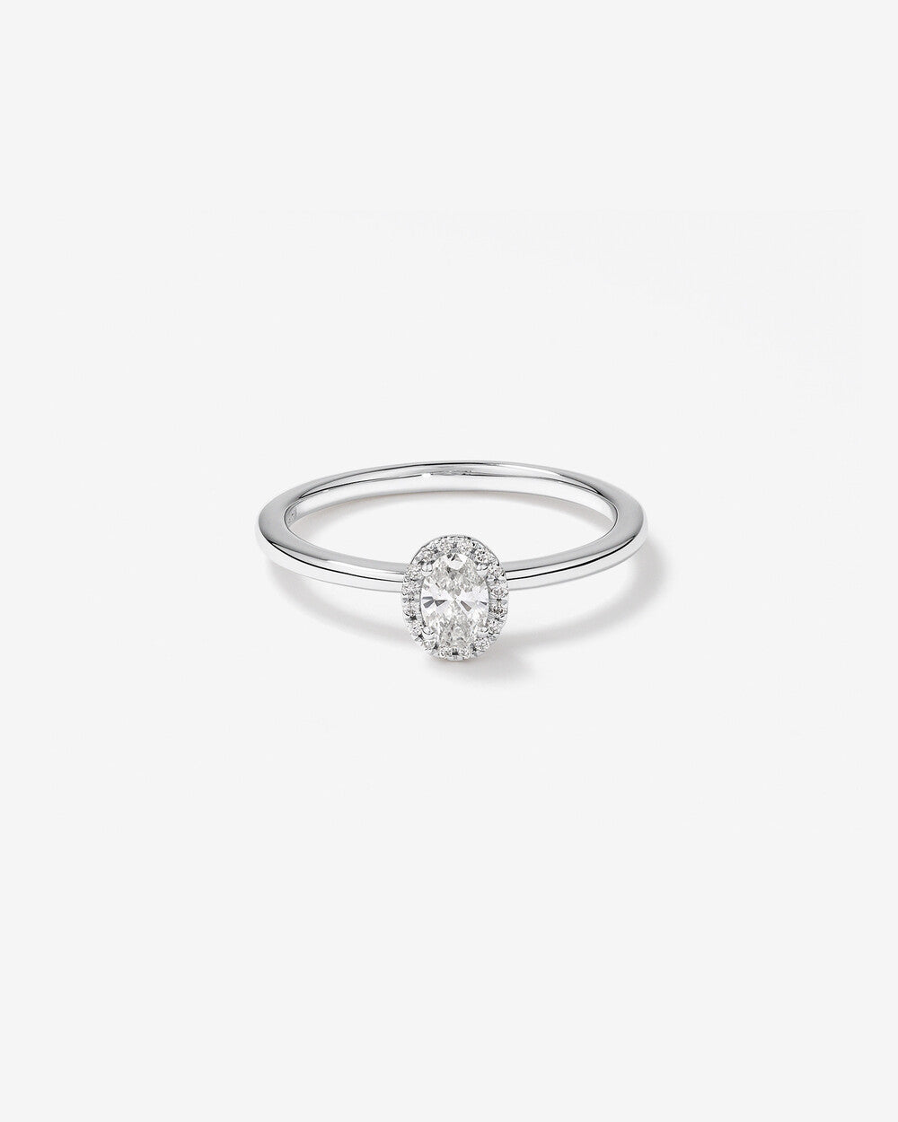 Stunning 0.3 CT Oval Moissanite Engagement Ring In Halo Design 1