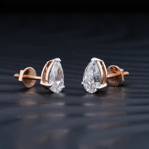 2.0 TCW Pear Cut Moissanite Stud Earrings in Gold