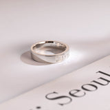 Delicate Moissanite Band with 0.20 TCW Emerald Cut Stones in Solid Gold 10